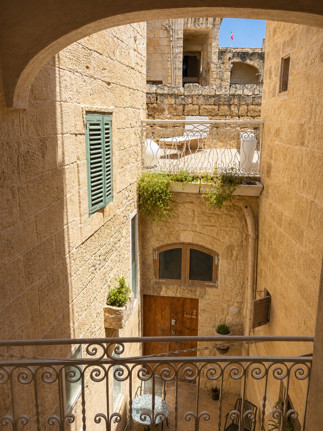 The courtyard seen from the upper balcony